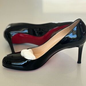 Louboutin Round Toe Black Patent Leather Pumps
